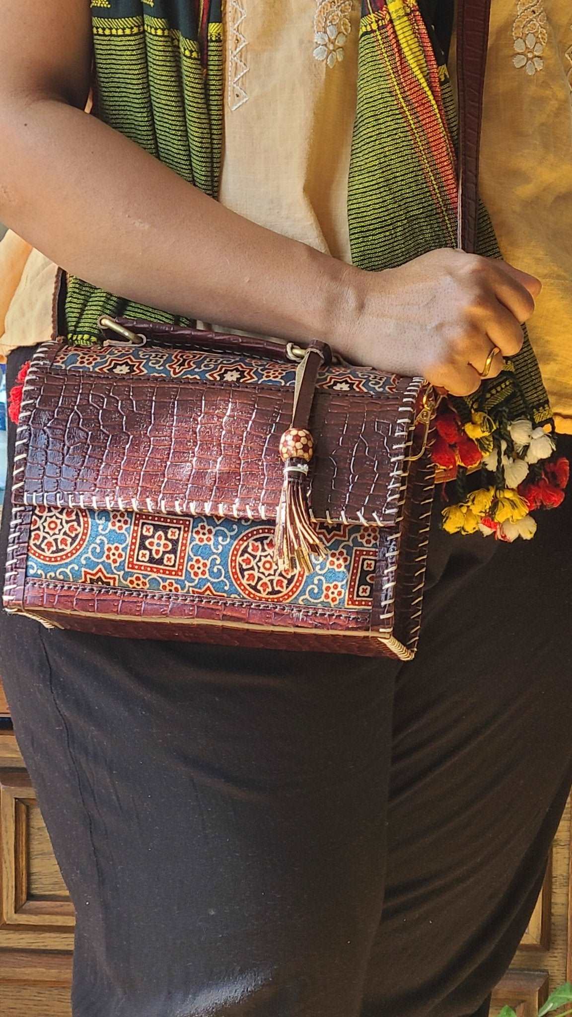 Exquisite Kutch Handmade Leather and Ajrakh Bag - Fusion of Artisan Craftsmanship and Traditional Prints - Indianidhi