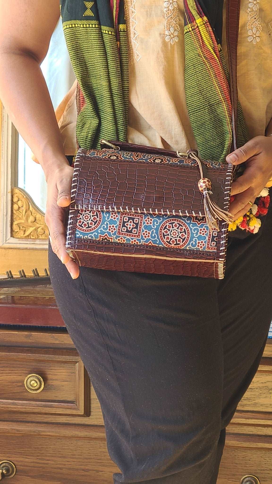 Exquisite Kutch Handmade Leather and Ajrakh Bag - Fusion of Artisan Craftsmanship and Traditional Prints - Indianidhi