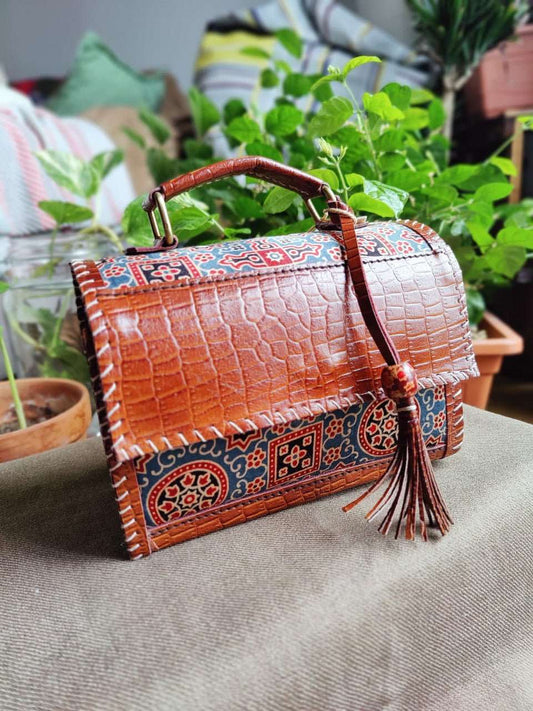 Exquisite Kutch Handmade Leather and Ajrakh Bag - Fusion of Artisan Craftsmanship and Traditional Prints - Indianidhi